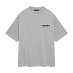 Playera Fear of God Essentials Gris